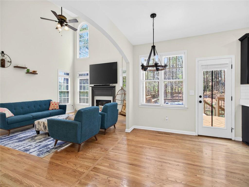 8840 Appling Ridge Cumming, GA 30041 - Photo 24 of 87 a living room with furniture and a flat screen tv