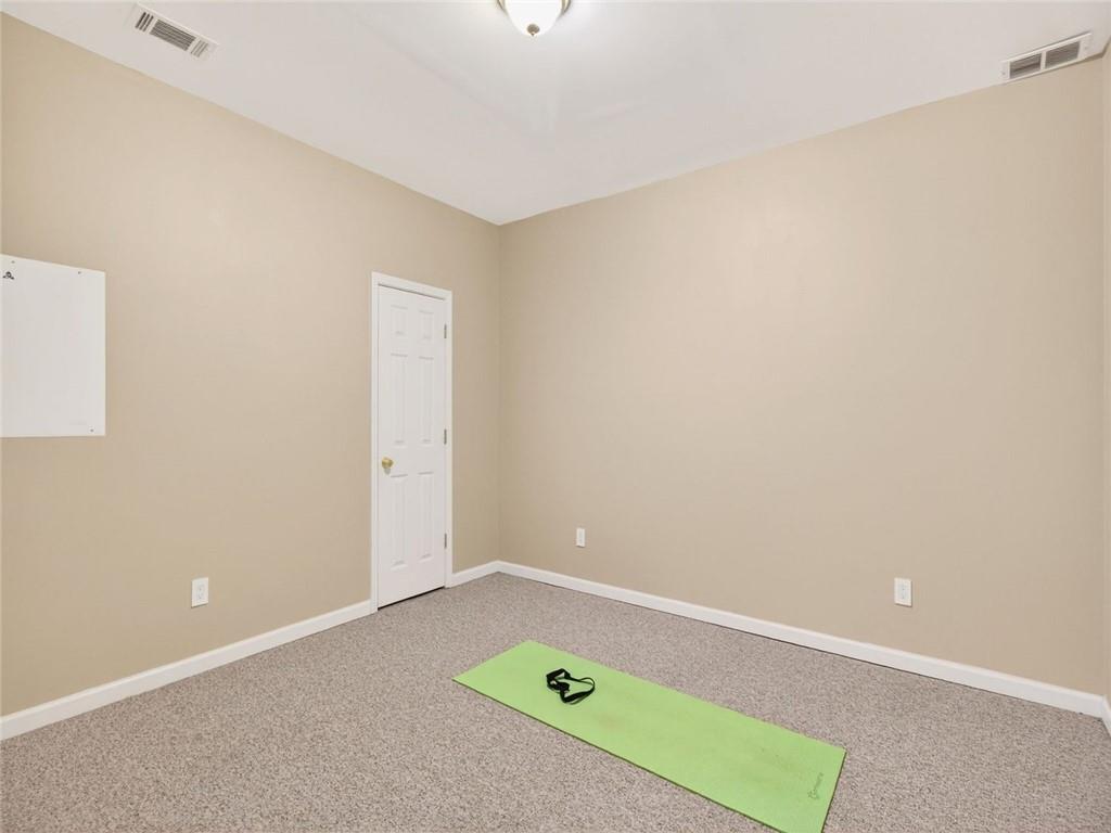 8840 Appling Ridge Cumming, GA 30041 - Photo 52 of 87 a view of an empty room