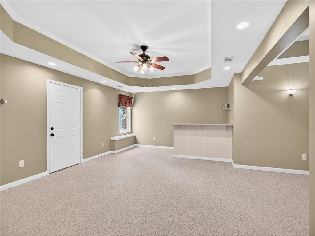 8840 Appling Ridge Cumming, GA 30041 - Photo 60 of 87 a view of an empty room with a window