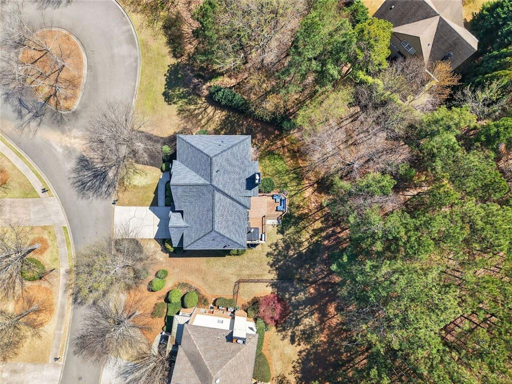 8840 Appling Ridge Cumming, GA 30041 - Photo 77 of 87 an aerial view of a house with swimming pool