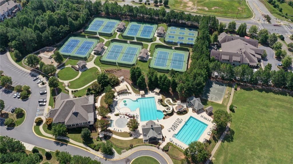 8840 Appling Ridge Cumming, GA 30041 - Photo 80 of 87 an aerial view of residential house with outdoor space and parking