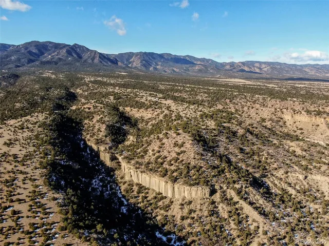 a view of mountain and a mountain
