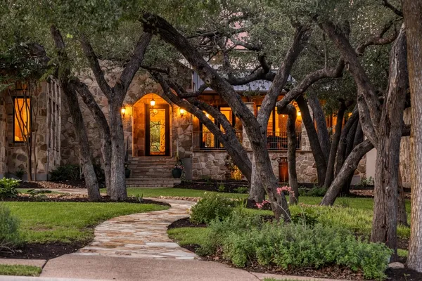 a backyard of a house with lots of green space