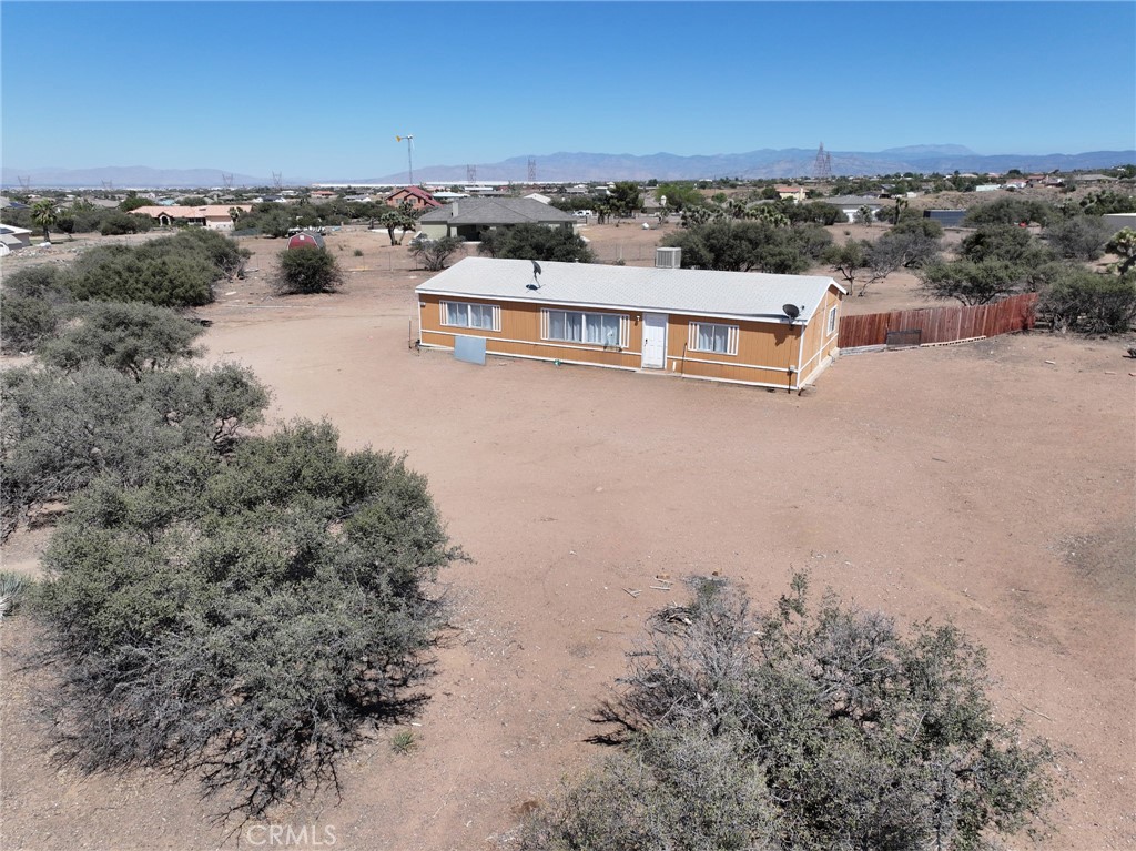 8195 Alta Mesa Road Oak Hills, CA 92344 - Photo 2 of 33 an aerial view of a house with a lake view