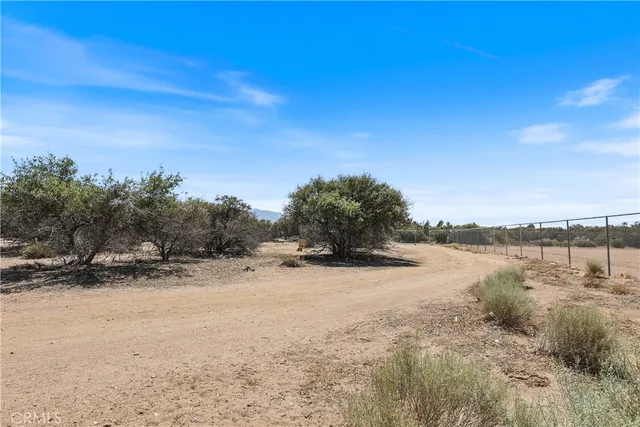 a view of lake with mountain in the back