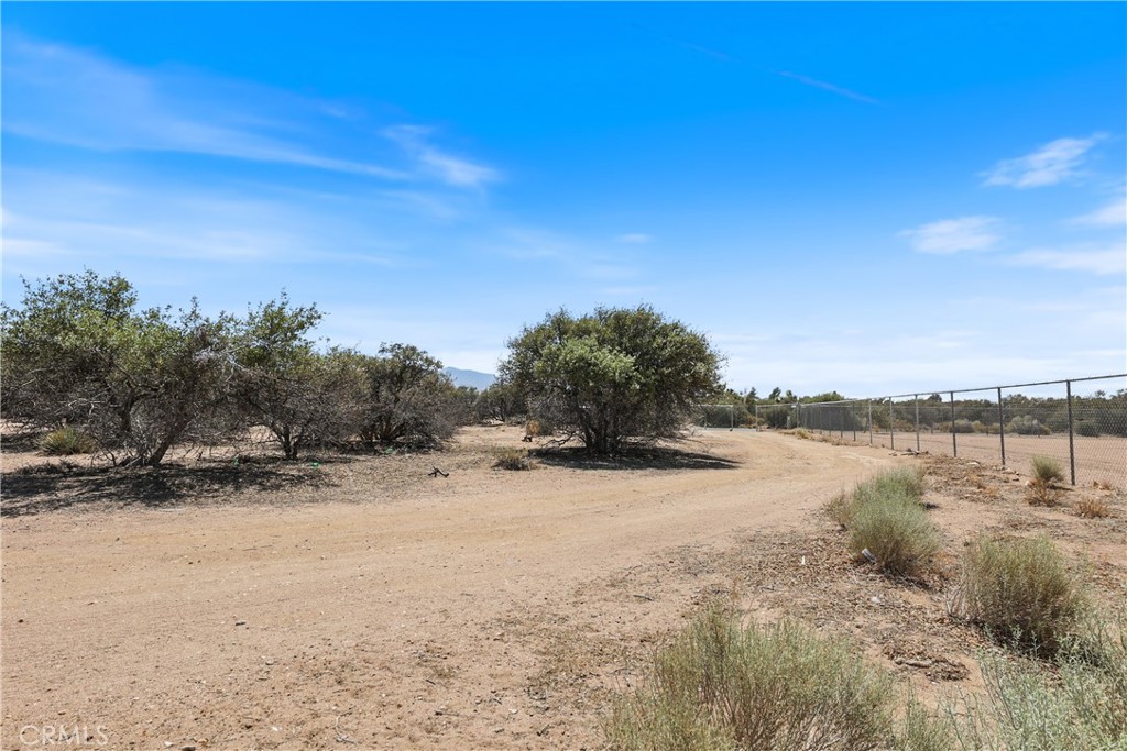 8195 Alta Mesa Road Oak Hills, CA 92344 - Photo 22 of 33 a view of lake with mountain in the back