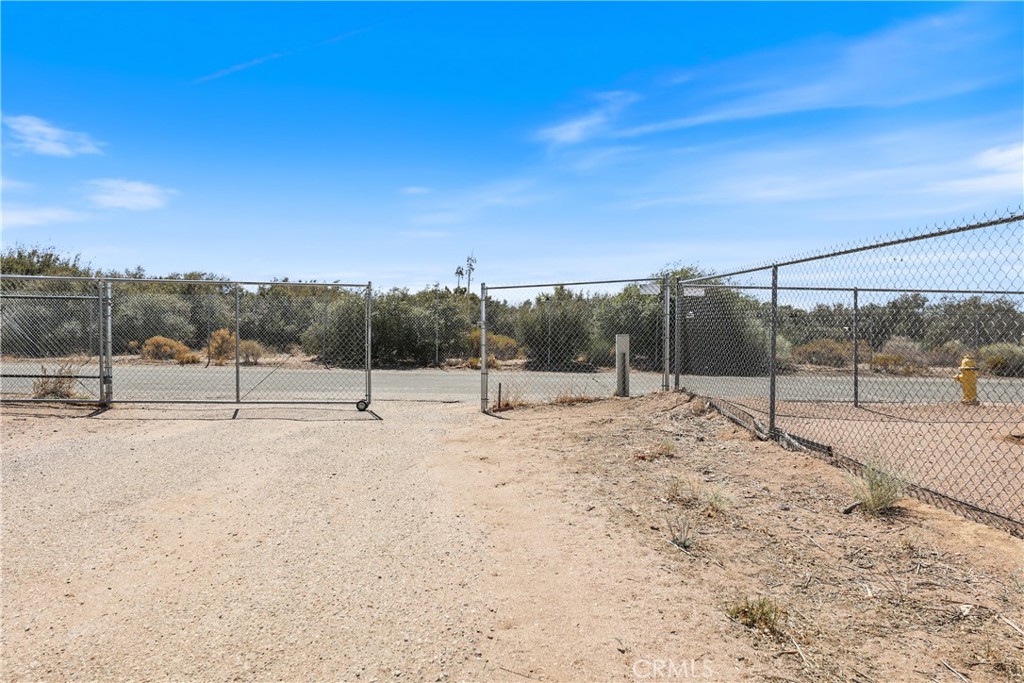 8195 Alta Mesa Road Oak Hills, CA 92344 - Photo 23 of 33 a view of a backyard