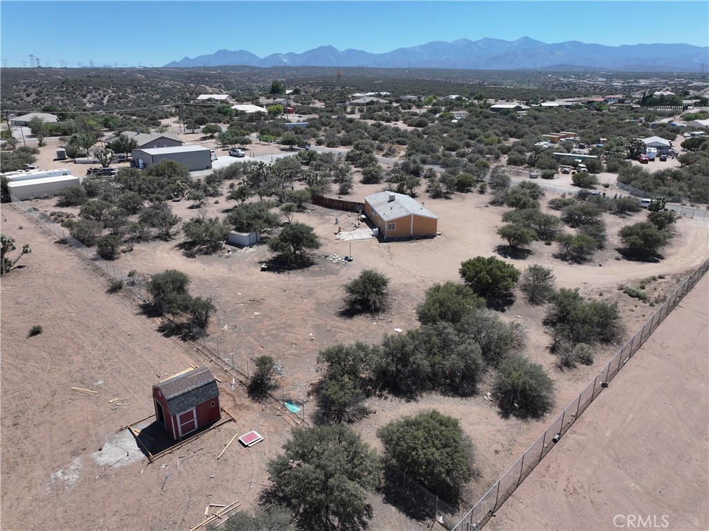 8195 Alta Mesa Road Oak Hills, CA 92344 - Photo 27 of 33 an aerial view of multiple houses with yard