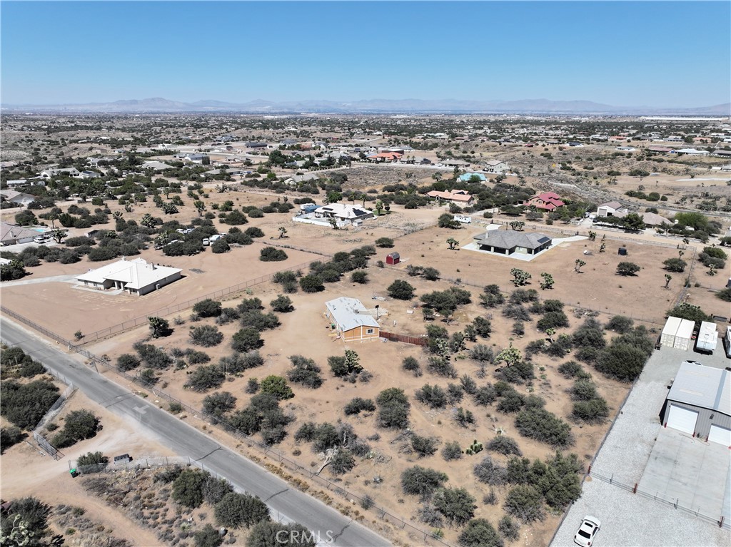 8195 Alta Mesa Road Oak Hills, CA 92344 - Photo 31 of 33 an aerial view of a house