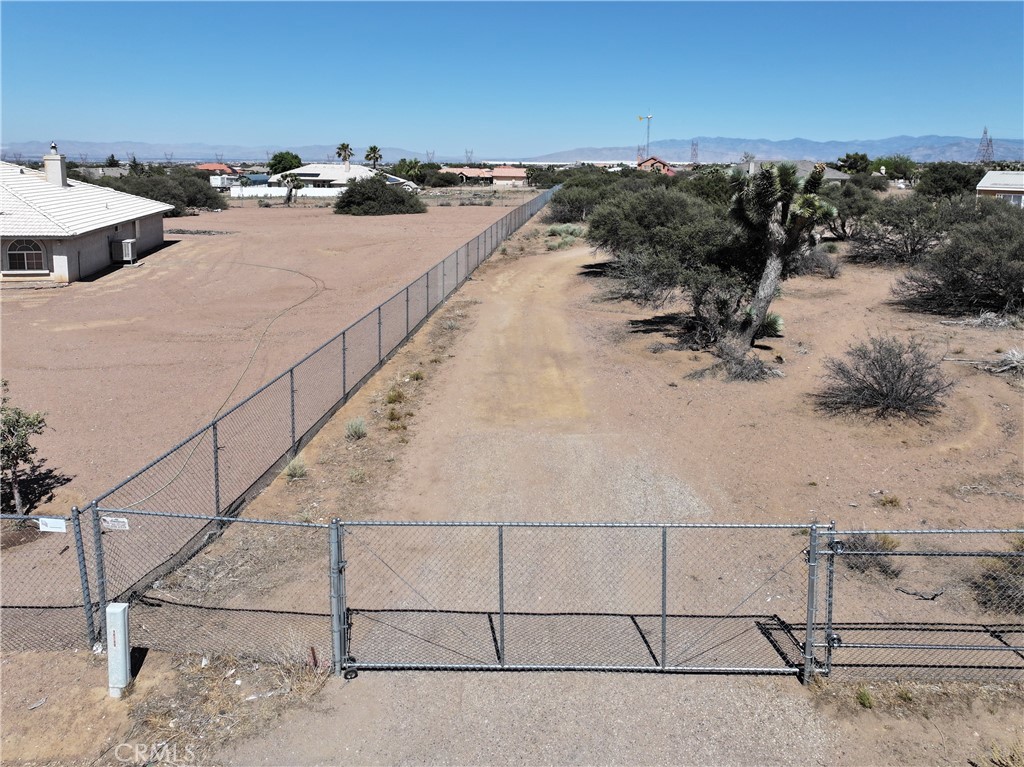 8195 Alta Mesa Road Oak Hills, CA 92344 - Photo 33 of 33 a view of a terrace with wooden floor