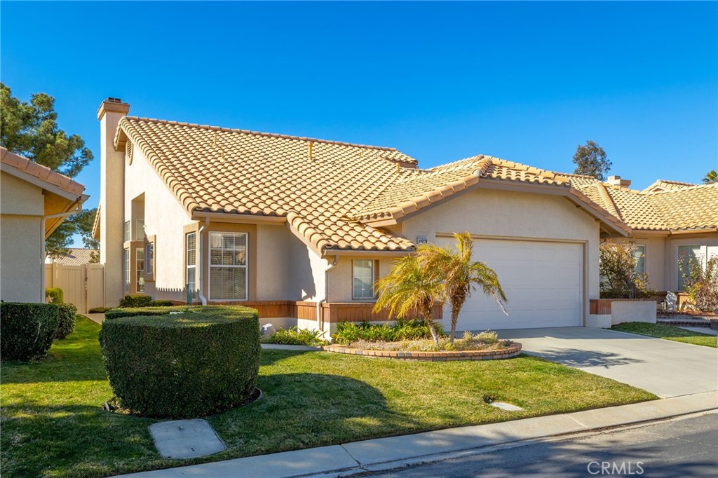 1237 Pauma Valley Road Banning, CA 92220 - Photo 1 of 1 a front view of a house with a garden