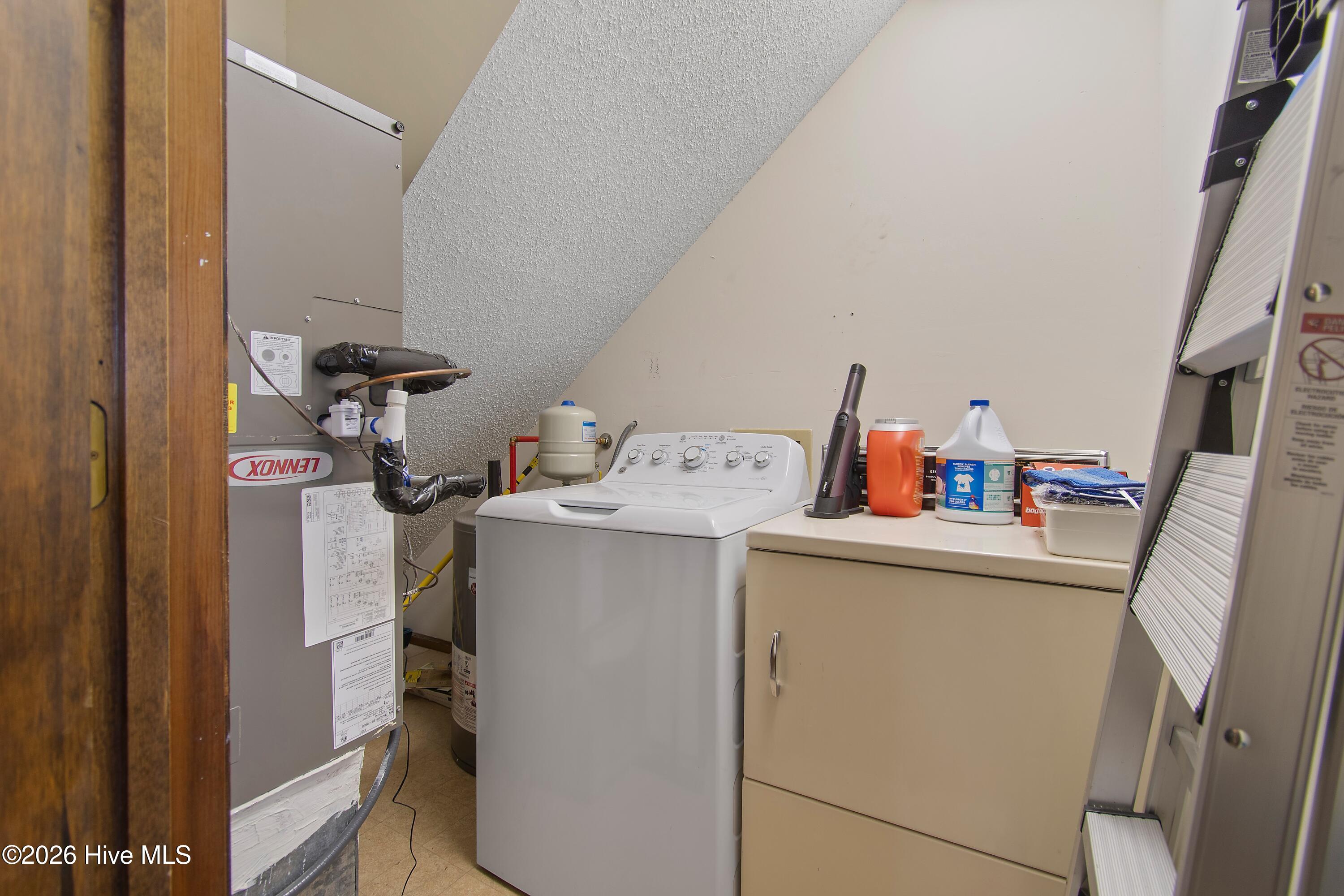 419 Sailfish Street Sunset Beach, NC 28468 - Photo 30 of 45 Laundry closet