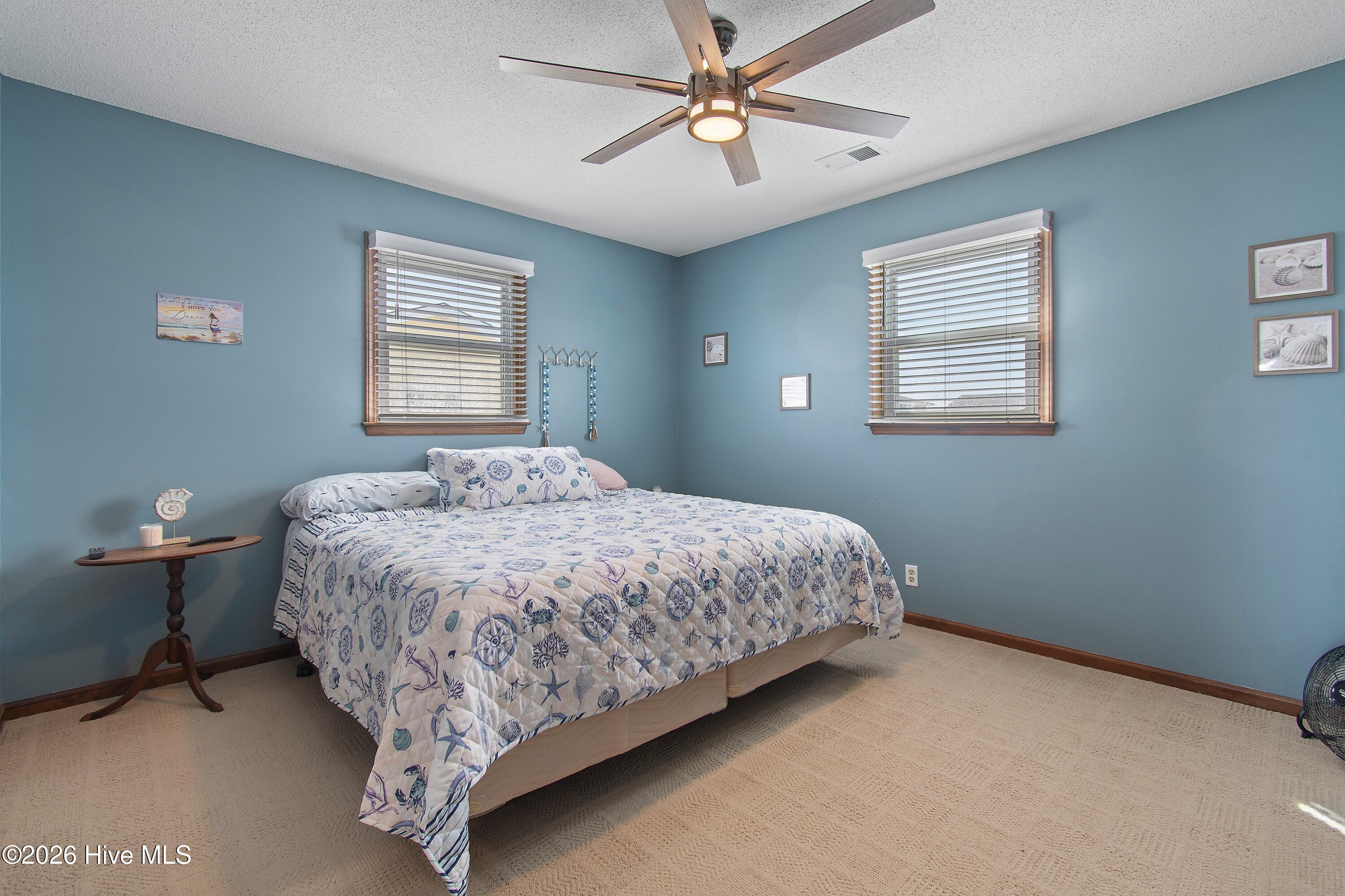 419 Sailfish Street Sunset Beach, NC 28468 - Photo 34 of 45 Upstairs Bedroom