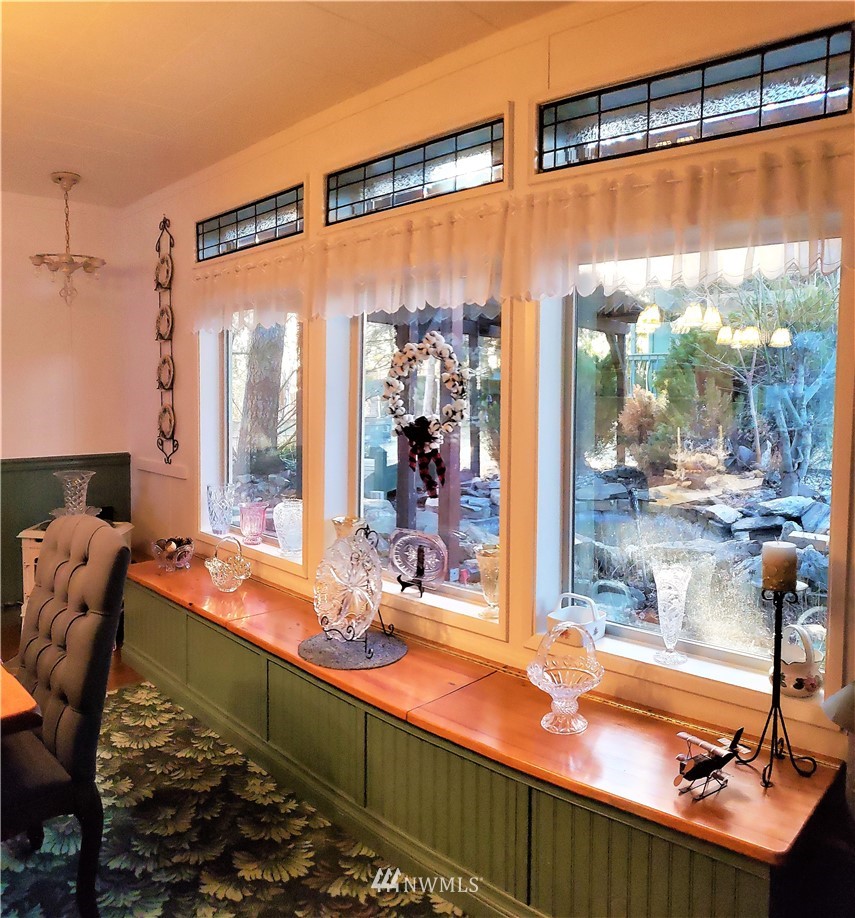 49 Sand Flat Road Omak, WA 98841 - Photo 18 of 40 a room with musical instrument pool table and windows
