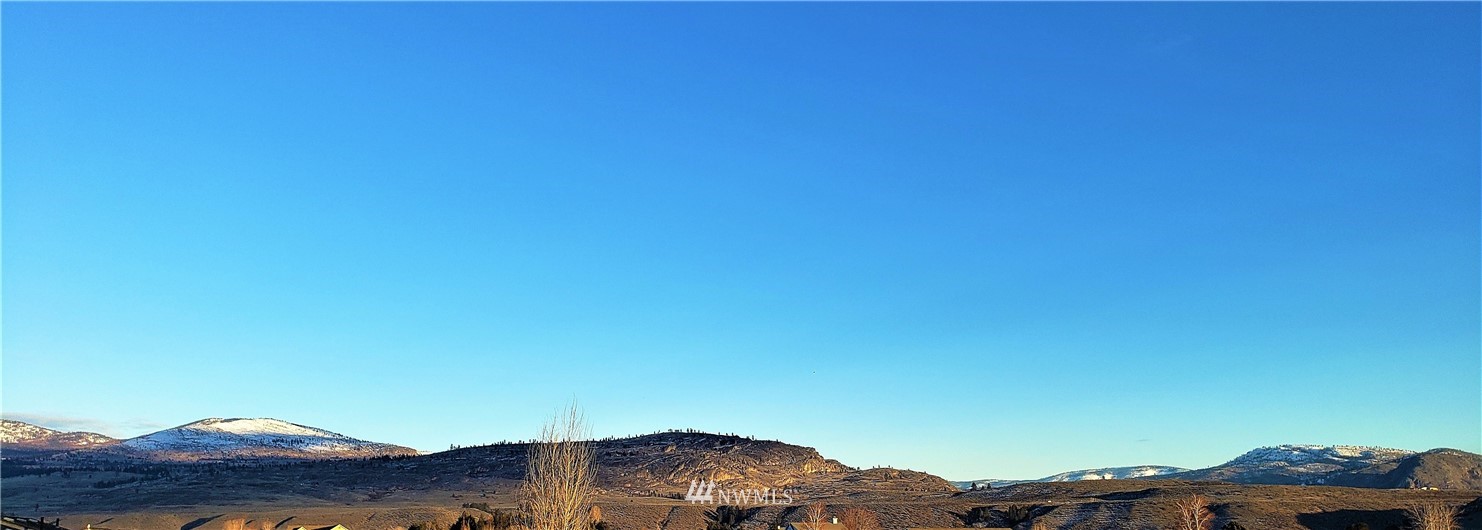 49 Sand Flat Road Omak, WA 98841 - Photo 39 of 40 a view of a lake in middle of the