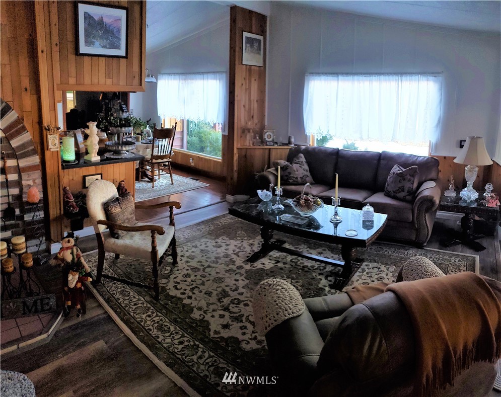 49 Sand Flat Road Omak, WA 98841 - Photo 8 of 40 a living room with furniture kitchen view and a window