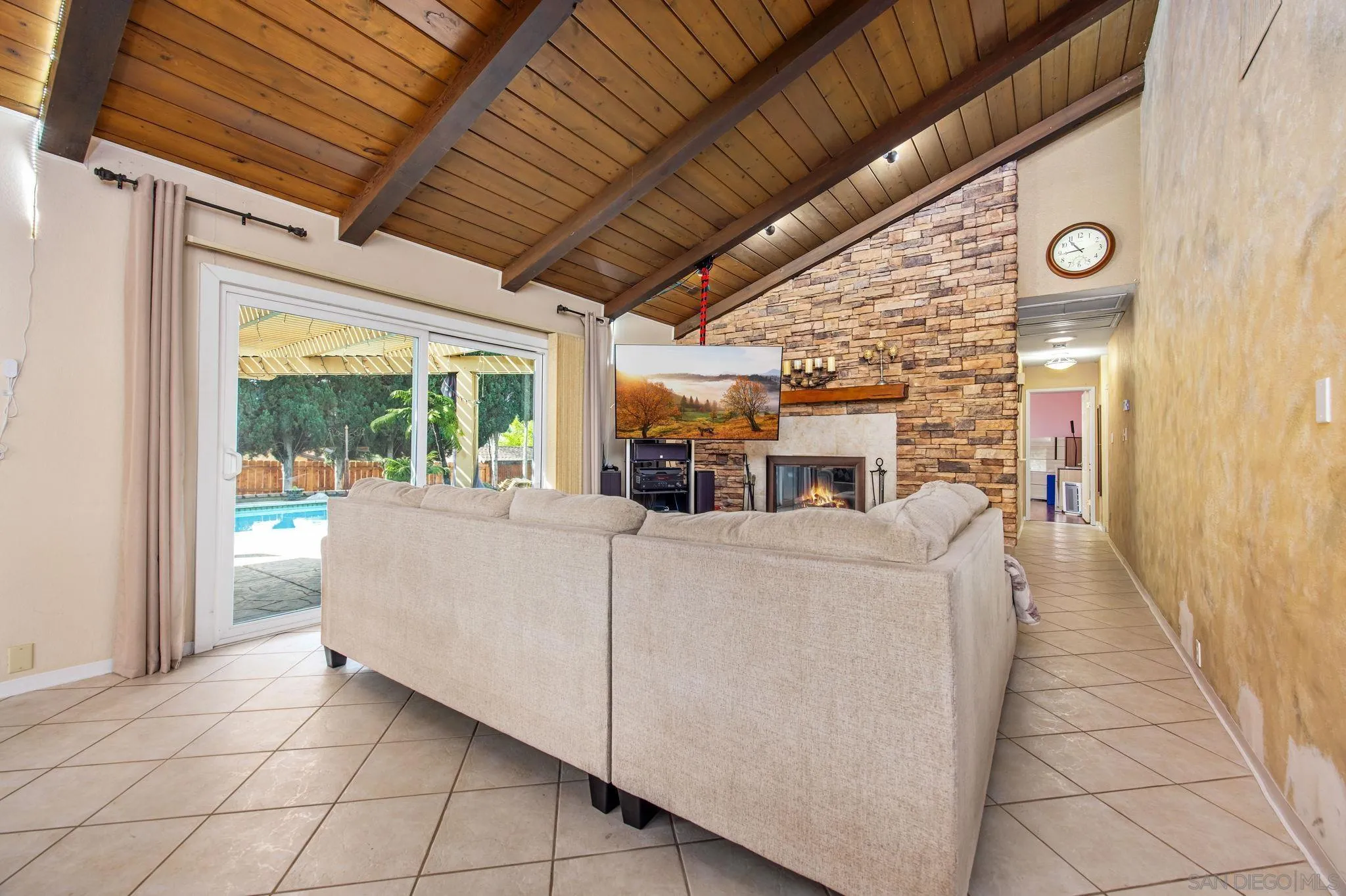 1673 Hidden Mesa Road El Cajon, CA 92019 - Photo 15 of 29 a living room with furniture and a fireplace