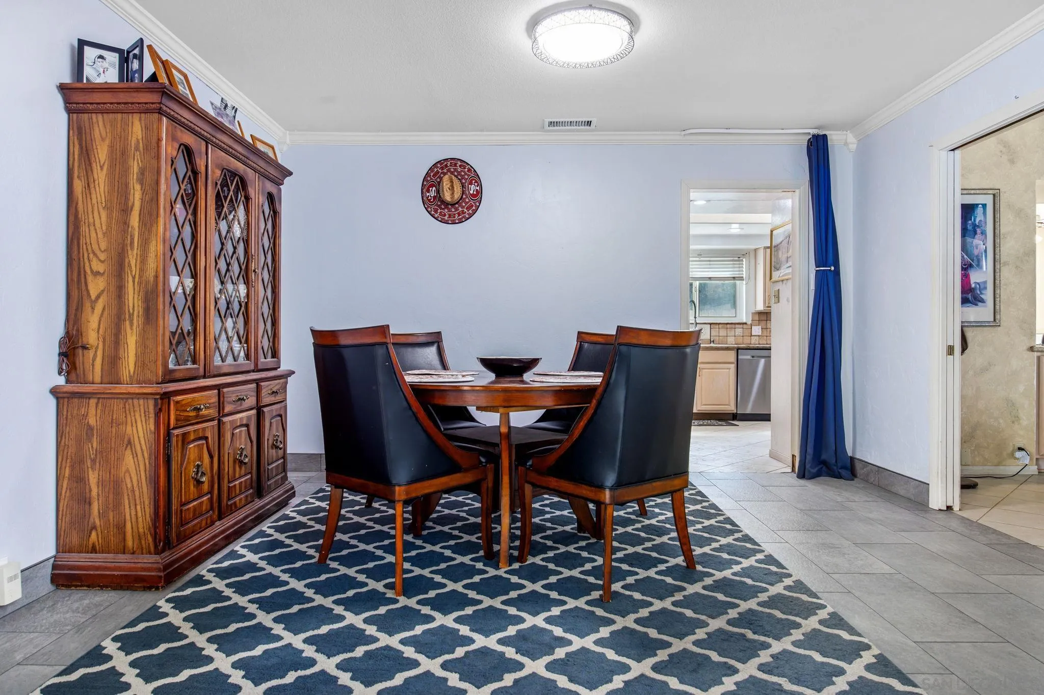 1673 Hidden Mesa Road El Cajon, CA 92019 - Photo 18 of 29 a view of a dining room with furniture and window