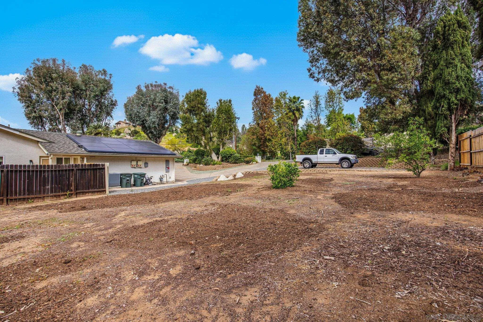 1673 Hidden Mesa Road El Cajon, CA 92019 - Photo 22 of 29 a view of backyard of house with green space