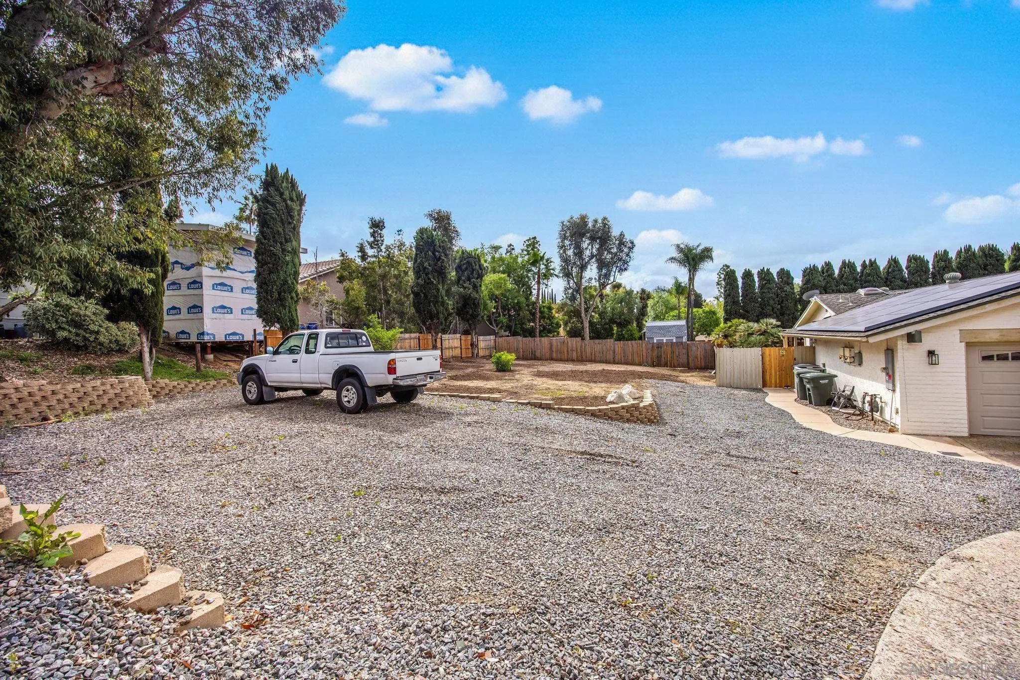 1673 Hidden Mesa Road El Cajon, CA 92019 - Photo 23 of 29 a view of a street with a car parked on the side of the road