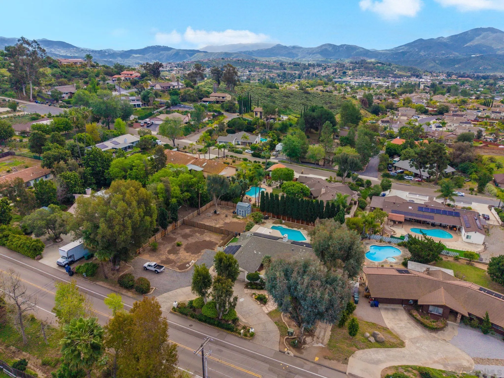 1673 Hidden Mesa Road El Cajon, CA 92019 - Photo 26 of 29 an aerial view of a city with lots of residential buildings