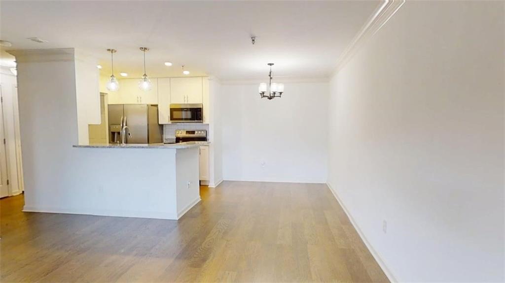 300 Johnson Ferry Road, Unit B201 Atlanta, GA 30328 - Photo 17 of 32 a view of a kitchen with a sink