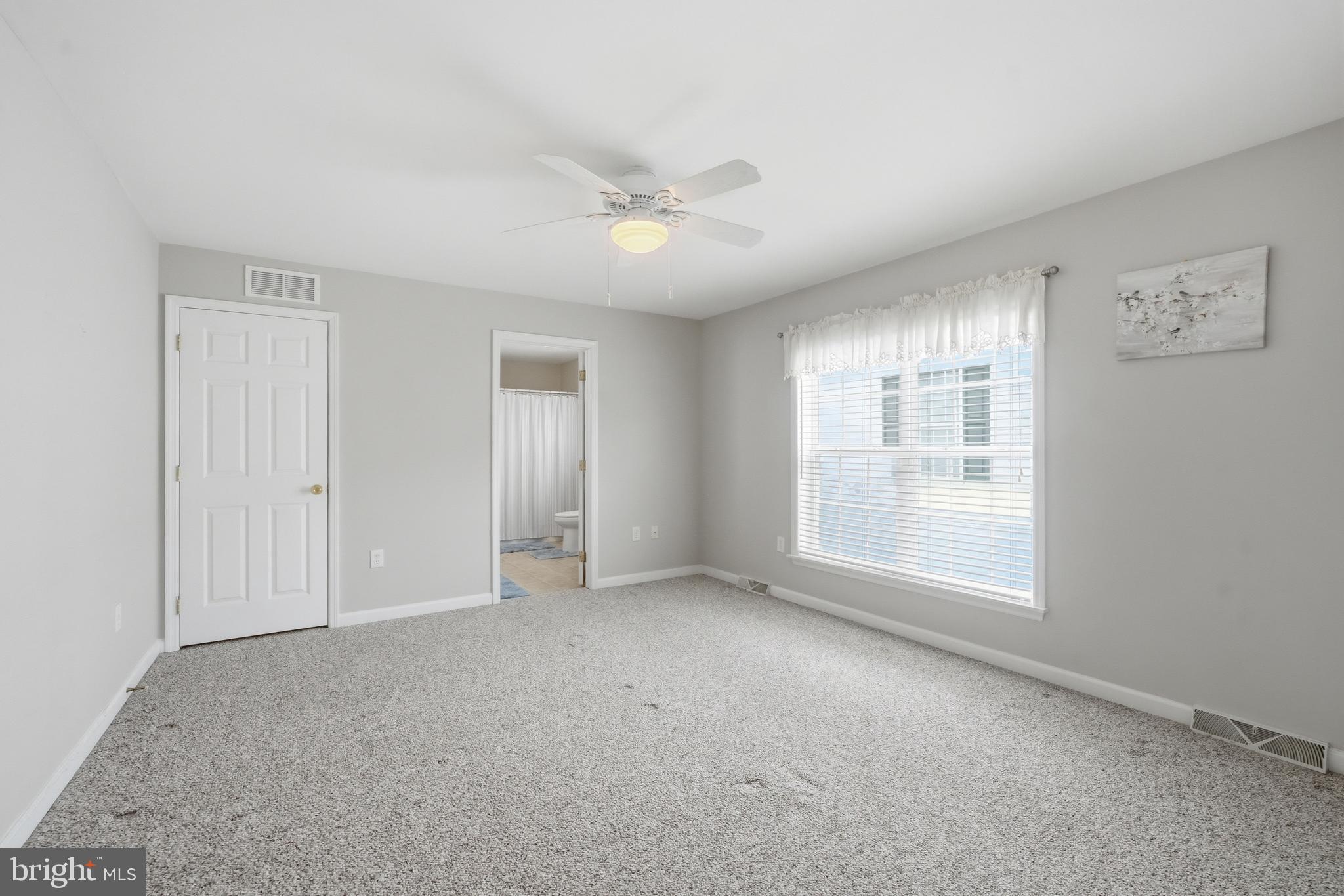 430 Rt Us 9 Street South, Unit 137 Marmora, NJ 08223 - Photo 14 of 24 a view of an empty room with a window