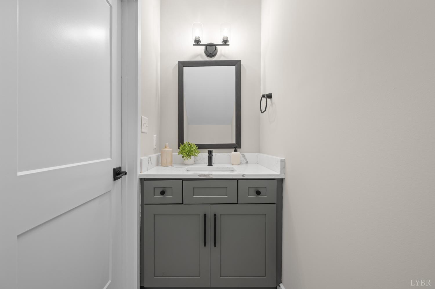 1106 South Westyn Loop Forest, VA 24551 - Photo 56 of 86 a bathroom with a sink and a mirror