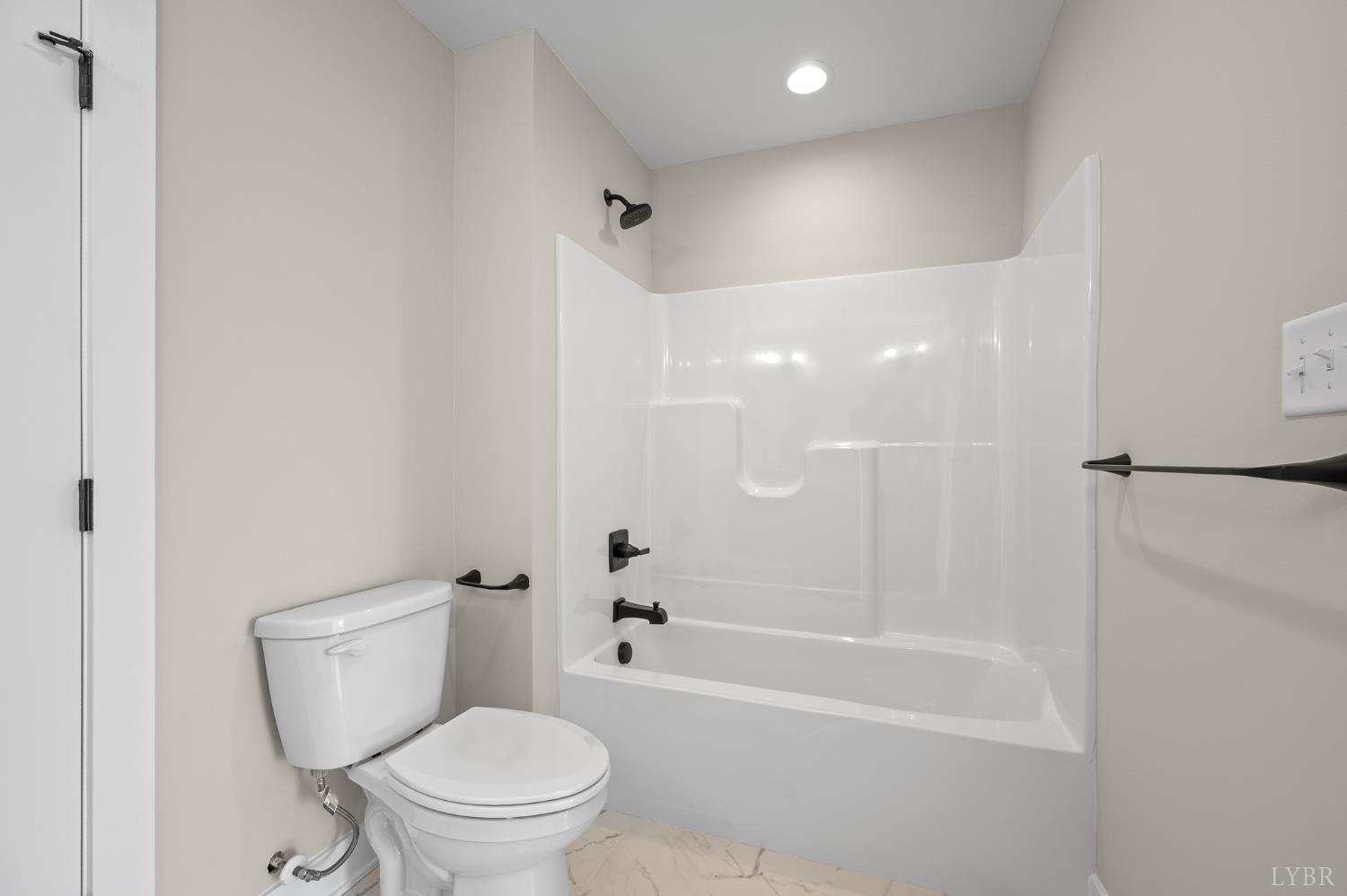 1106 South Westyn Loop Forest, VA 24551 - Photo 65 of 86 a white toilet sitting next to a bath tub