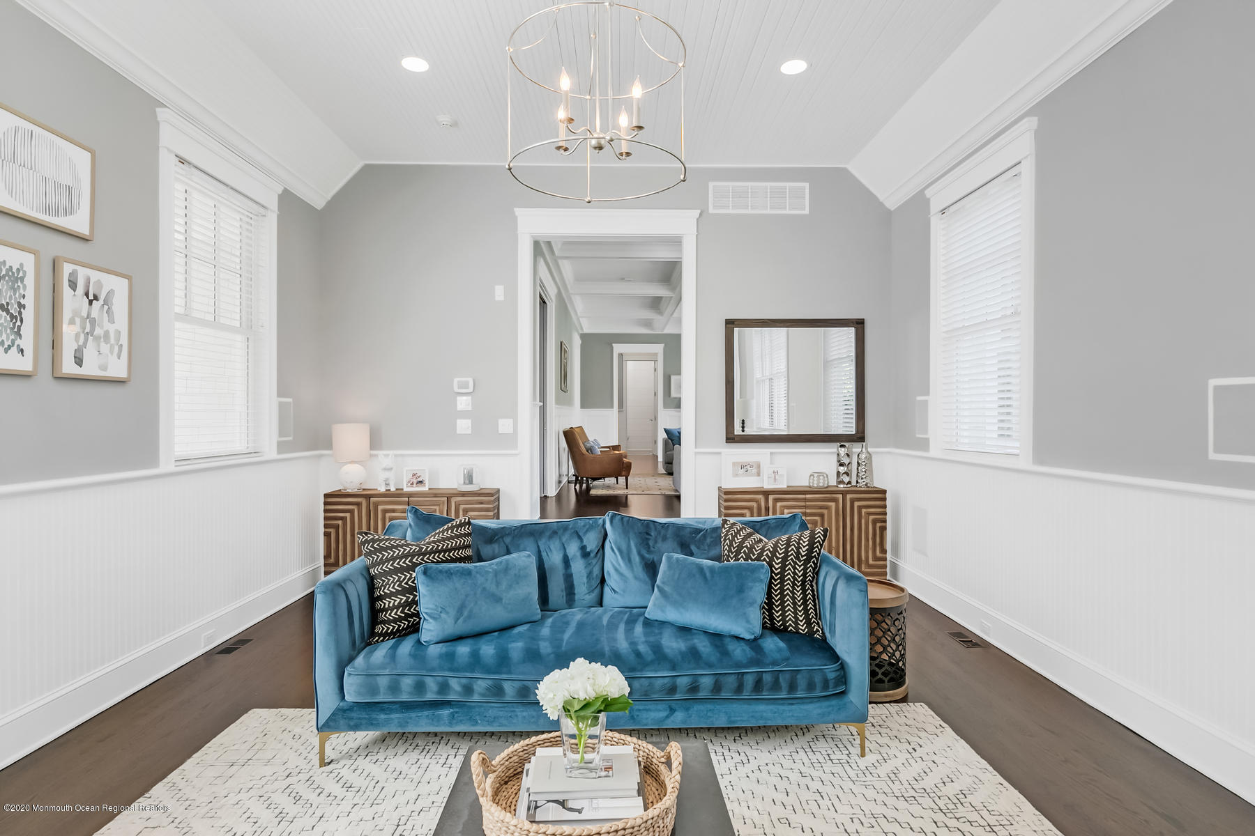 127 Ave Of Two Rivers Rumson, NJ 07760 - Photo 14 of 59 a living room with furniture and a chandelier