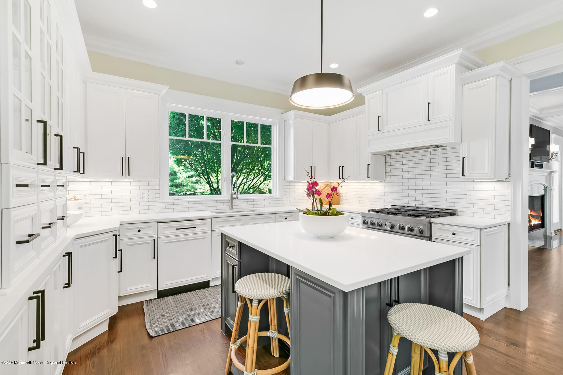 127 Ave Of Two Rivers Rumson, NJ 07760 - Photo 16 of 59 a kitchen with stainless steel appliances granite countertop a sink a stove a refrigerator cabinets and a dining table