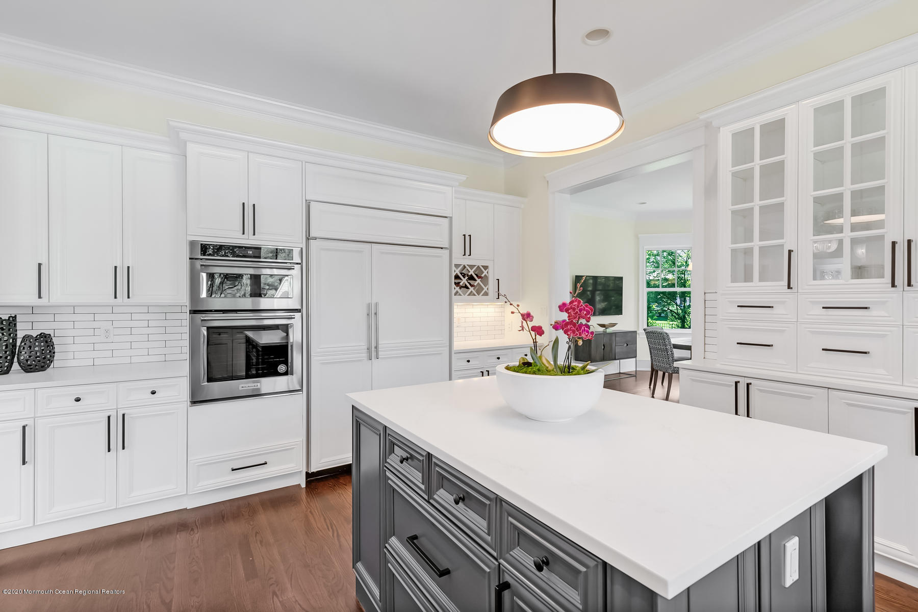 127 Ave Of Two Rivers Rumson, NJ 07760 - Photo 17 of 59 a kitchen with stainless steel appliances a stove refrigerator sink and cabinets