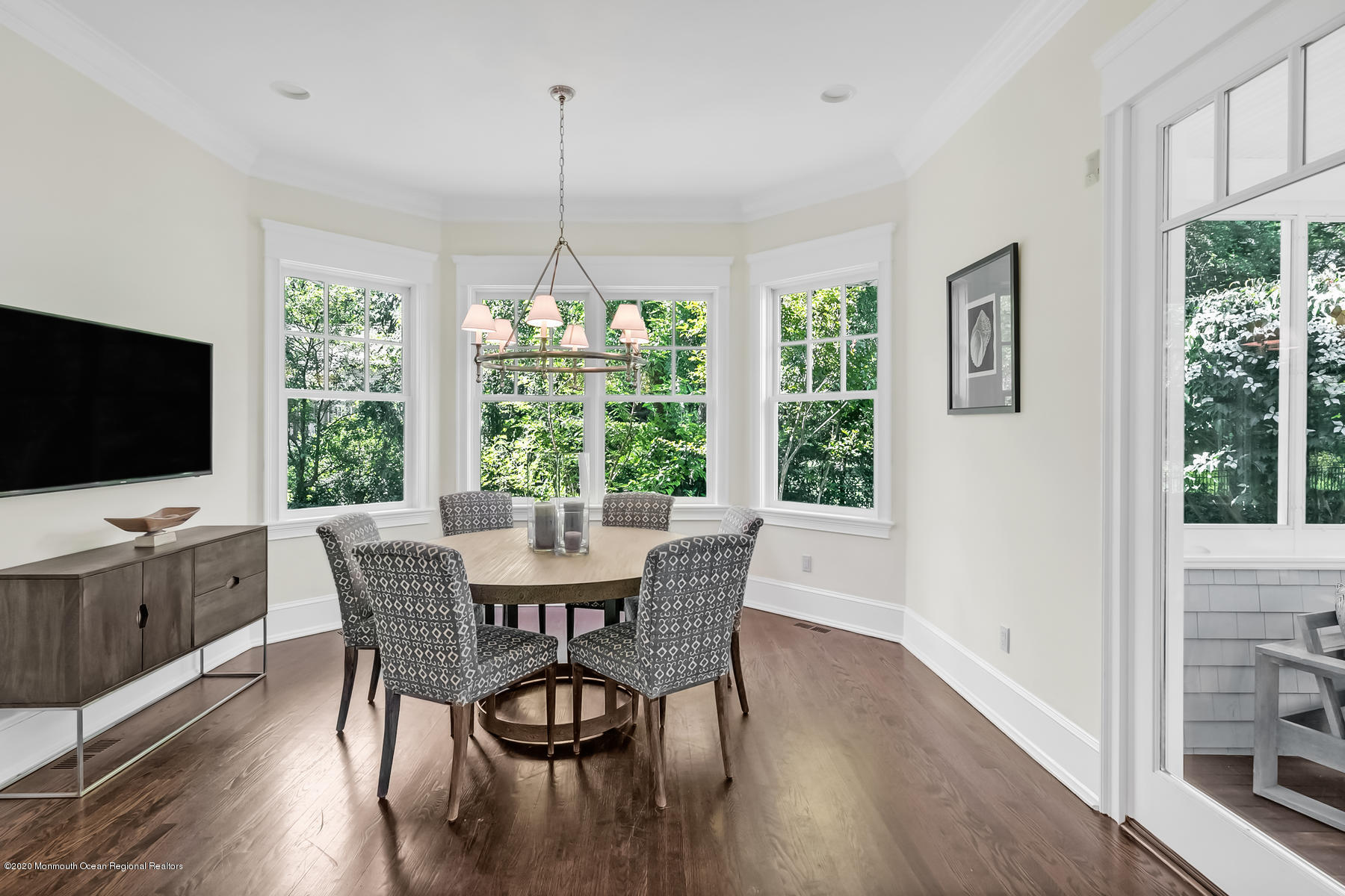 127 Ave Of Two Rivers Rumson, NJ 07760 - Photo 18 of 59 a dining room with furniture window wooden floor