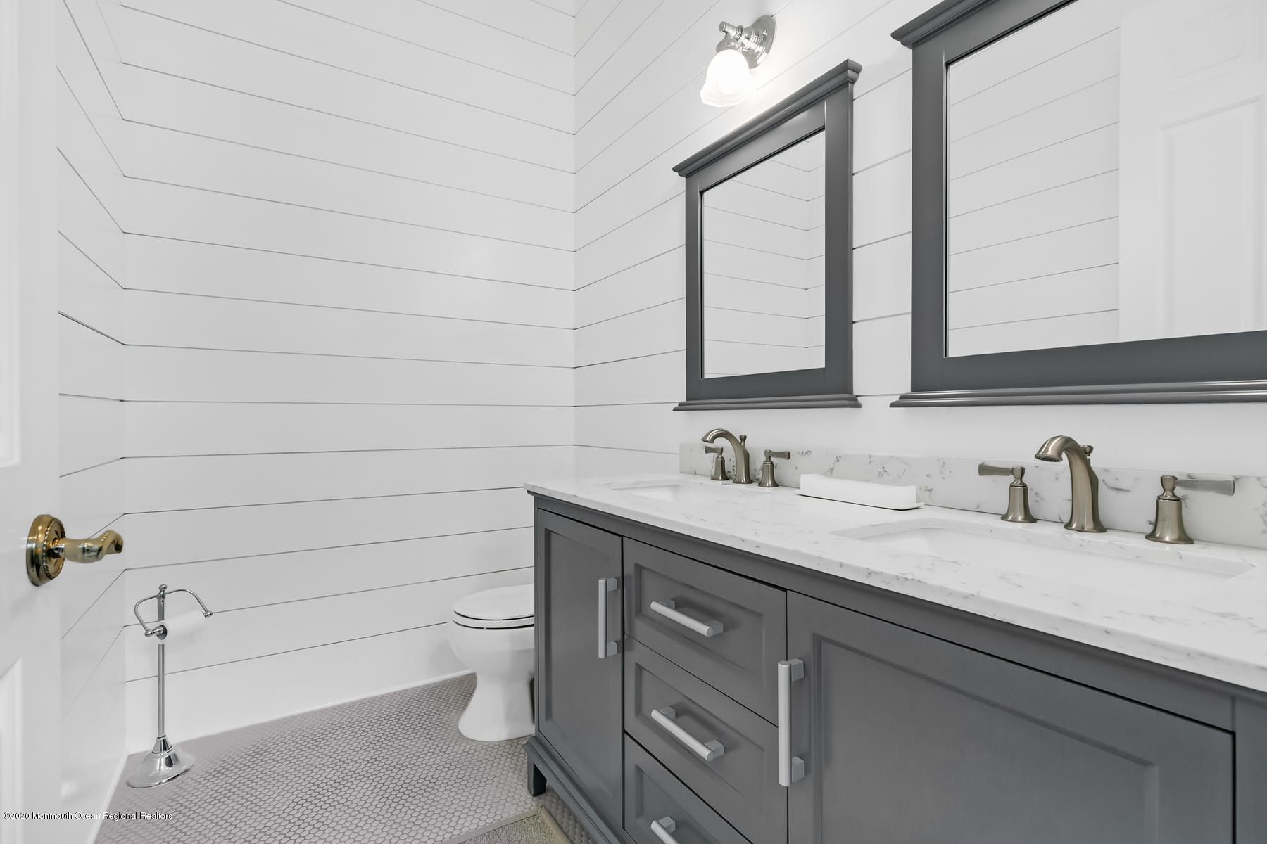 127 Ave Of Two Rivers Rumson, NJ 07760 - Photo 20 of 59 a bathroom with a granite countertop sink toilet and mirror