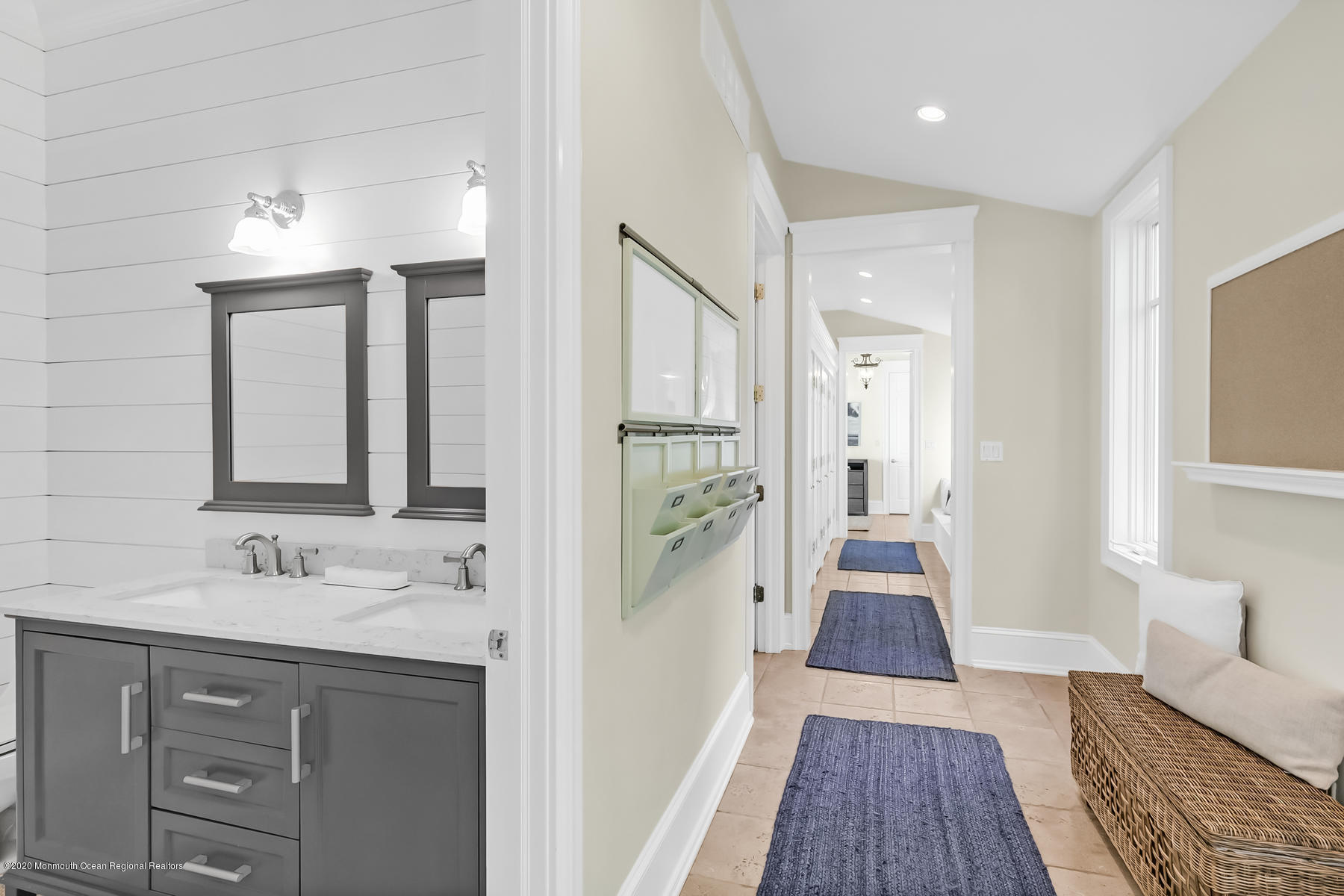 127 Ave Of Two Rivers Rumson, NJ 07760 - Photo 21 of 59 a bathroom with a sink a mirror and a shower