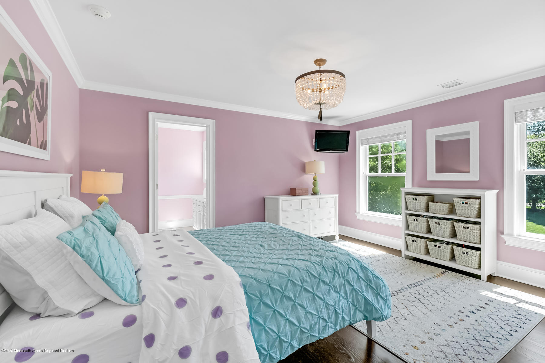 127 Ave Of Two Rivers Rumson, NJ 07760 - Photo 33 of 59 a bedroom with a bed a dresser and a window