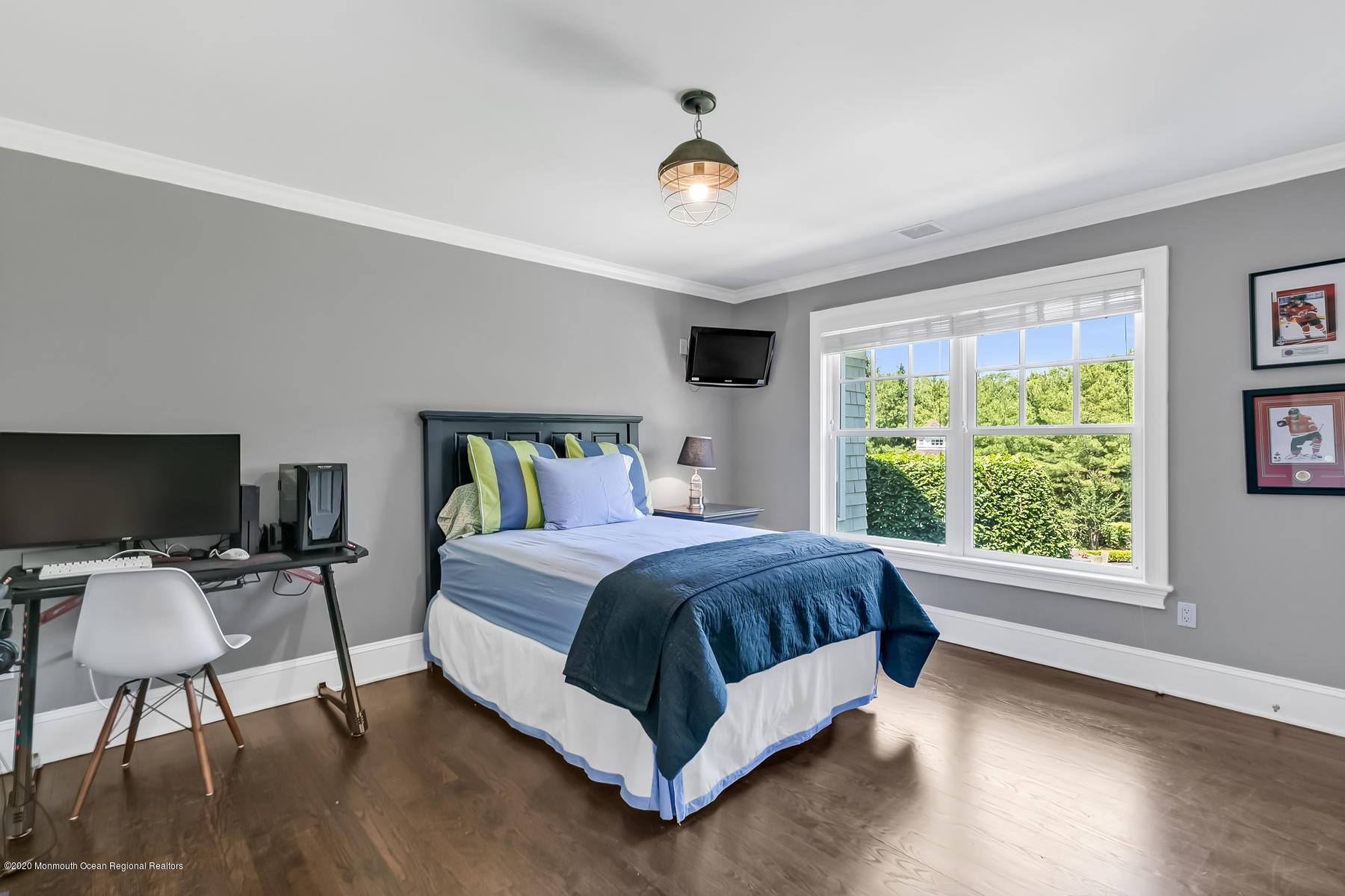 127 Ave Of Two Rivers Rumson, NJ 07760 - Photo 38 of 59 a spacious bedroom with a bed a table and a large window