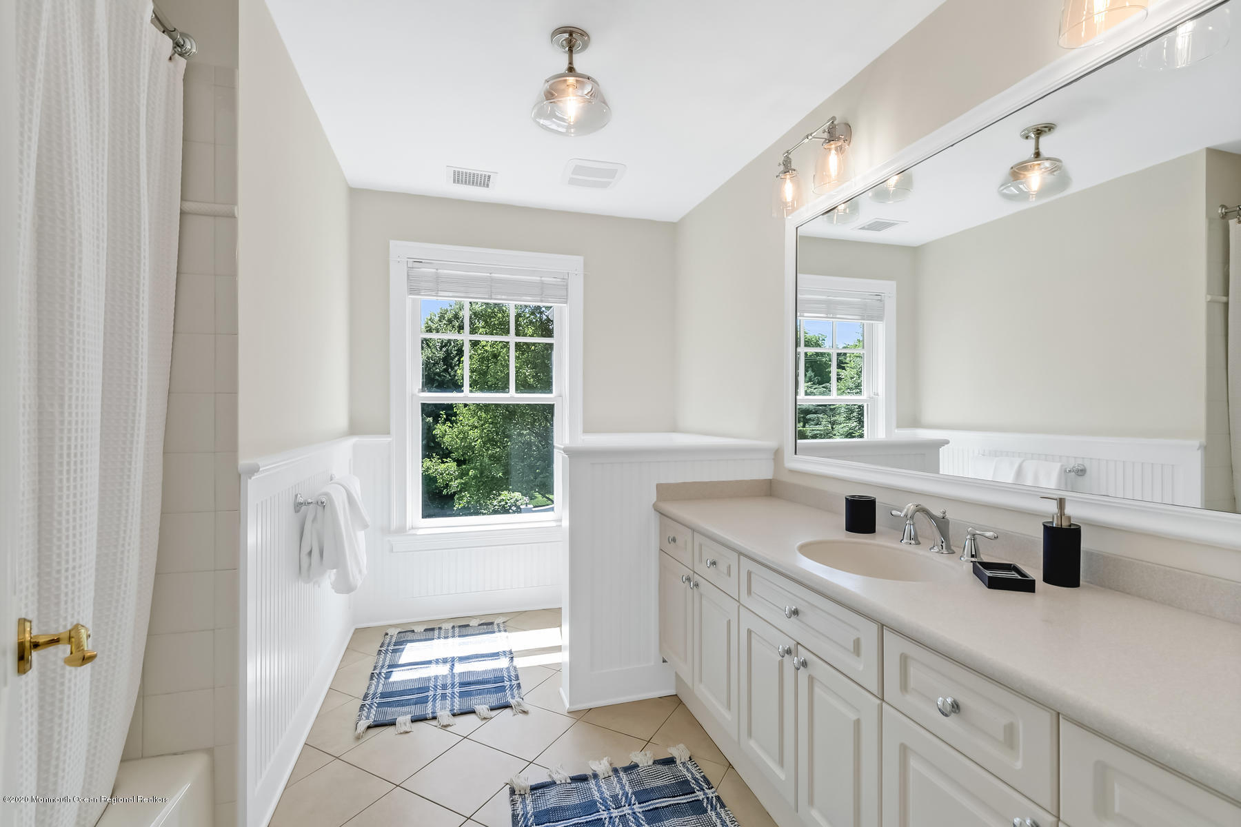 127 Ave Of Two Rivers Rumson, NJ 07760 - Photo 39 of 59 a kitchen with a sink a window and appliances