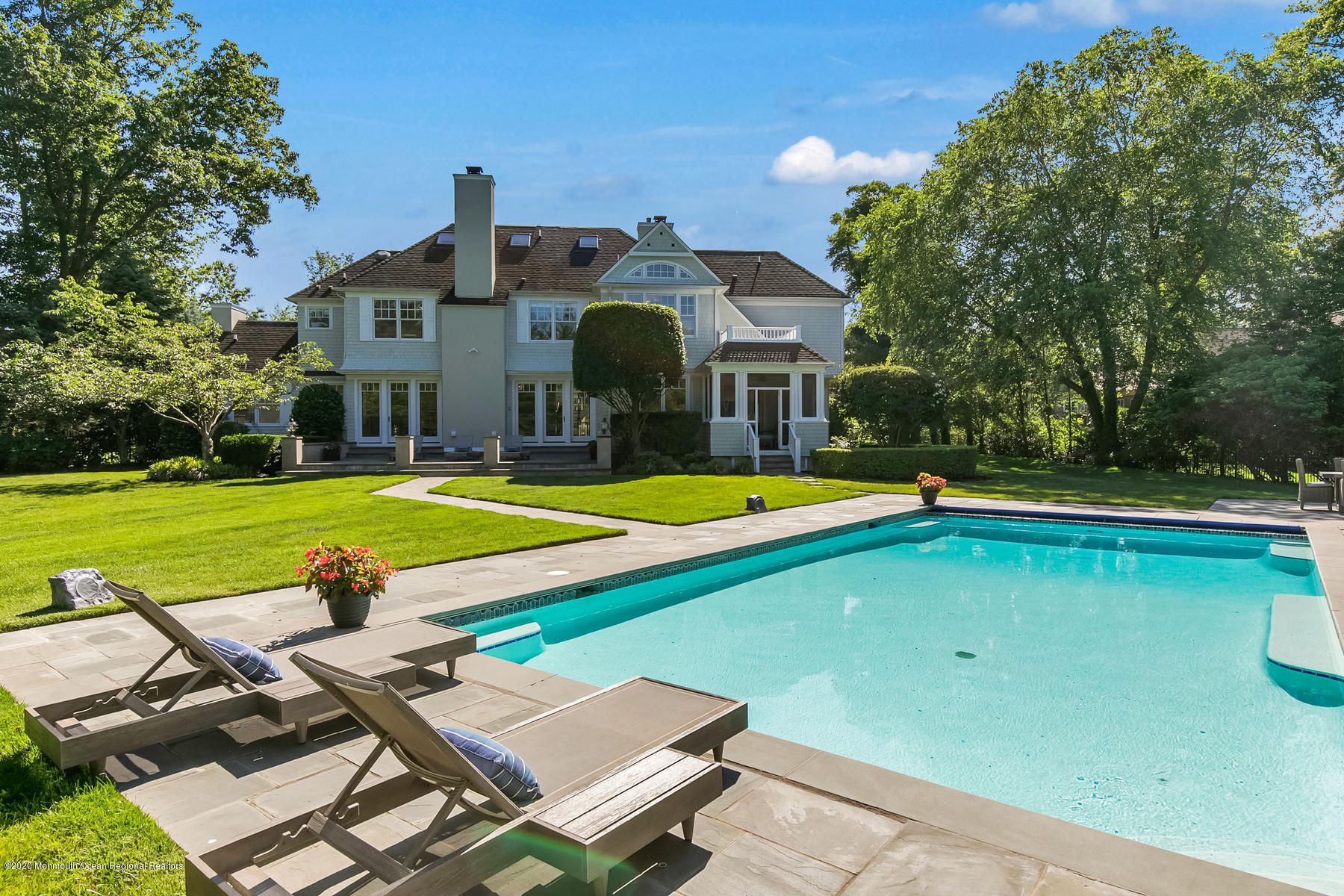 127 Ave Of Two Rivers Rumson, NJ 07760 - Photo 53 of 59 a view of a house with swimming pool
