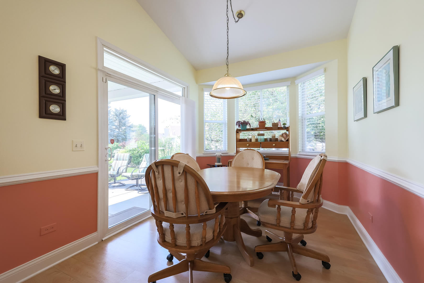 1472 Grand Haven Road Romeoville, IL 60446 - Photo 9 of 21 a view of a dining room with furniture window and wooden floor