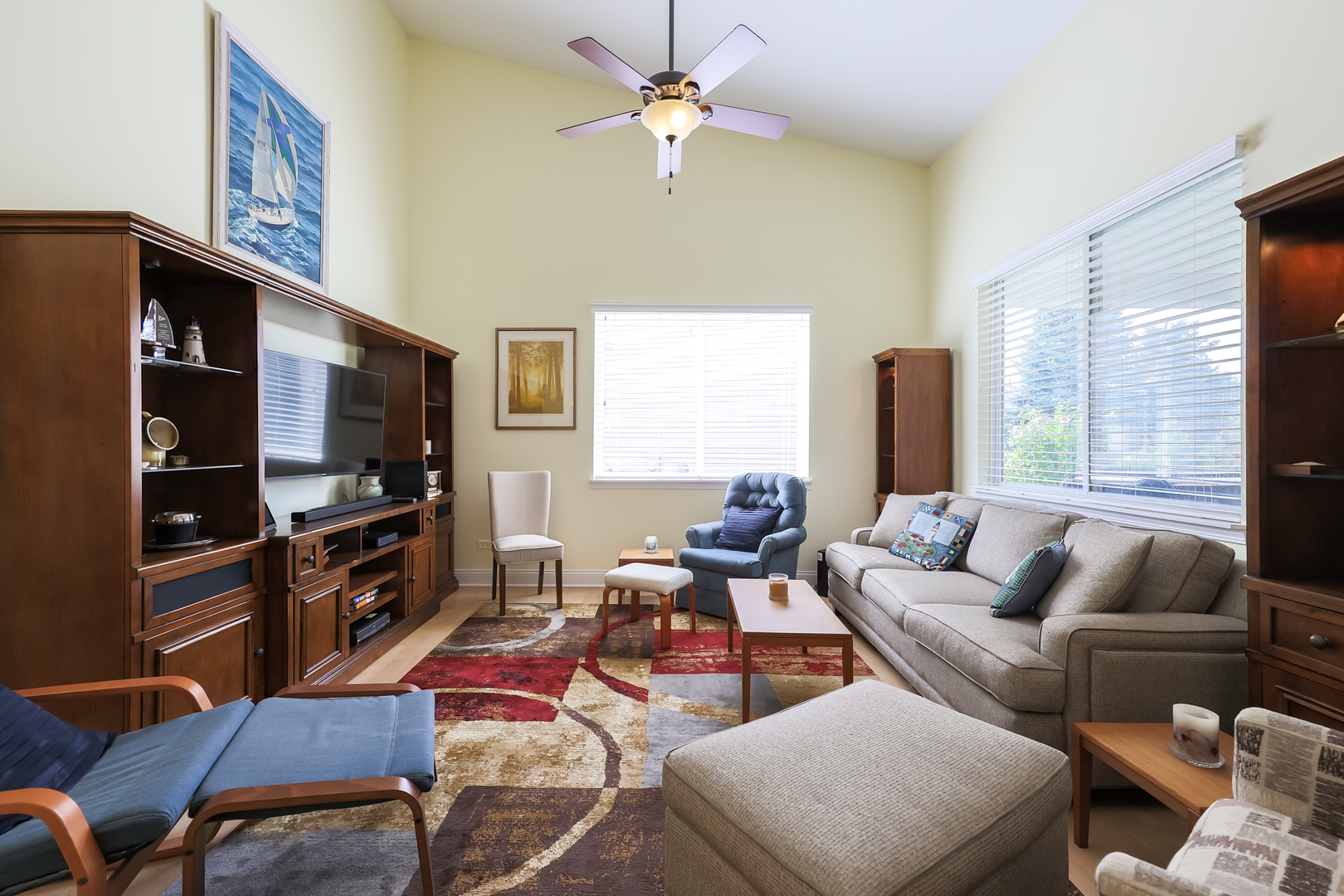 1472 Grand Haven Road Romeoville, IL 60446 - Photo 10 of 21 a living room with furniture a flat screen tv and a window