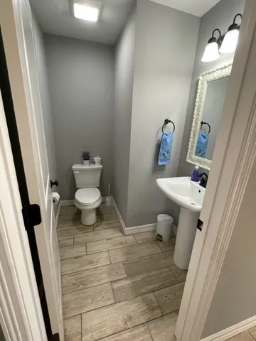 a bathroom with a sink and a toilet