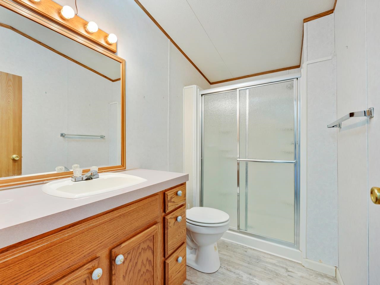 3195 F Road, Unit 22 Grand Junction, CO 81504 - Photo 17 of 24 a bathroom with a sink a toilet and shower