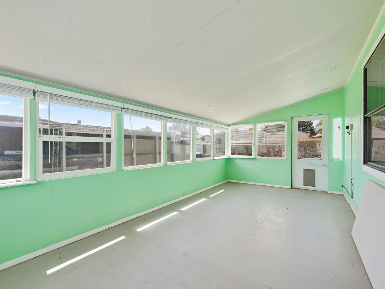 3195 F Road, Unit 22 Grand Junction, CO 81504 - Photo 20 of 24 a view of an empty room with a window