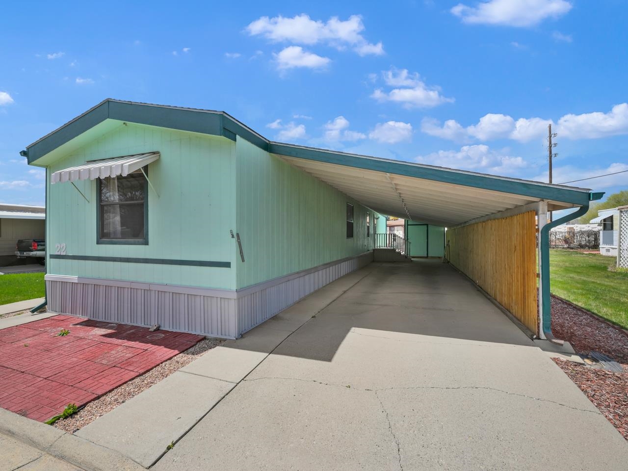 3195 F Road, Unit 22 Grand Junction, CO 81504 - Photo 2 of 24 a view of a backyard