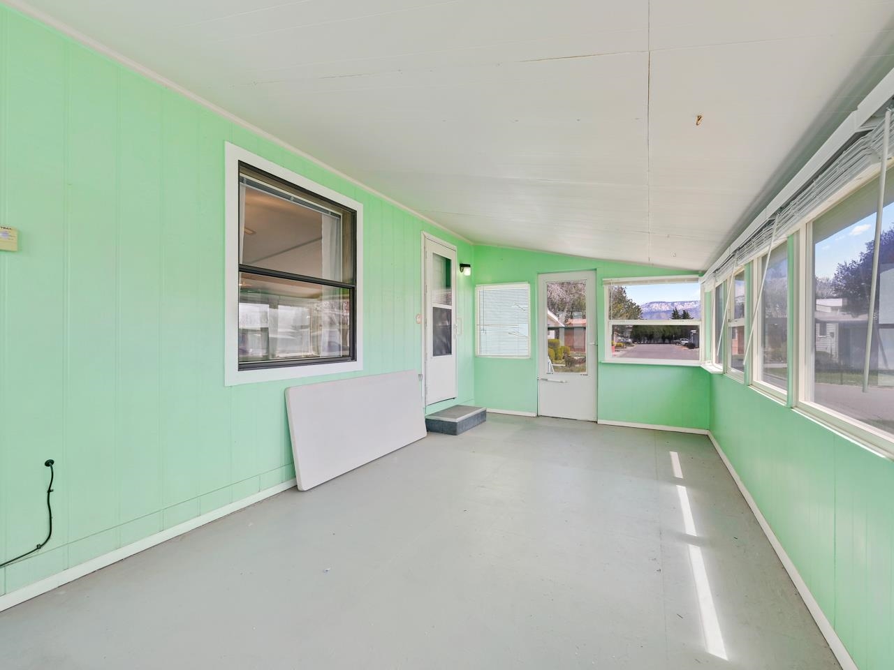 3195 F Road, Unit 22 Grand Junction, CO 81504 - Photo 21 of 24 a view of an empty room with a window