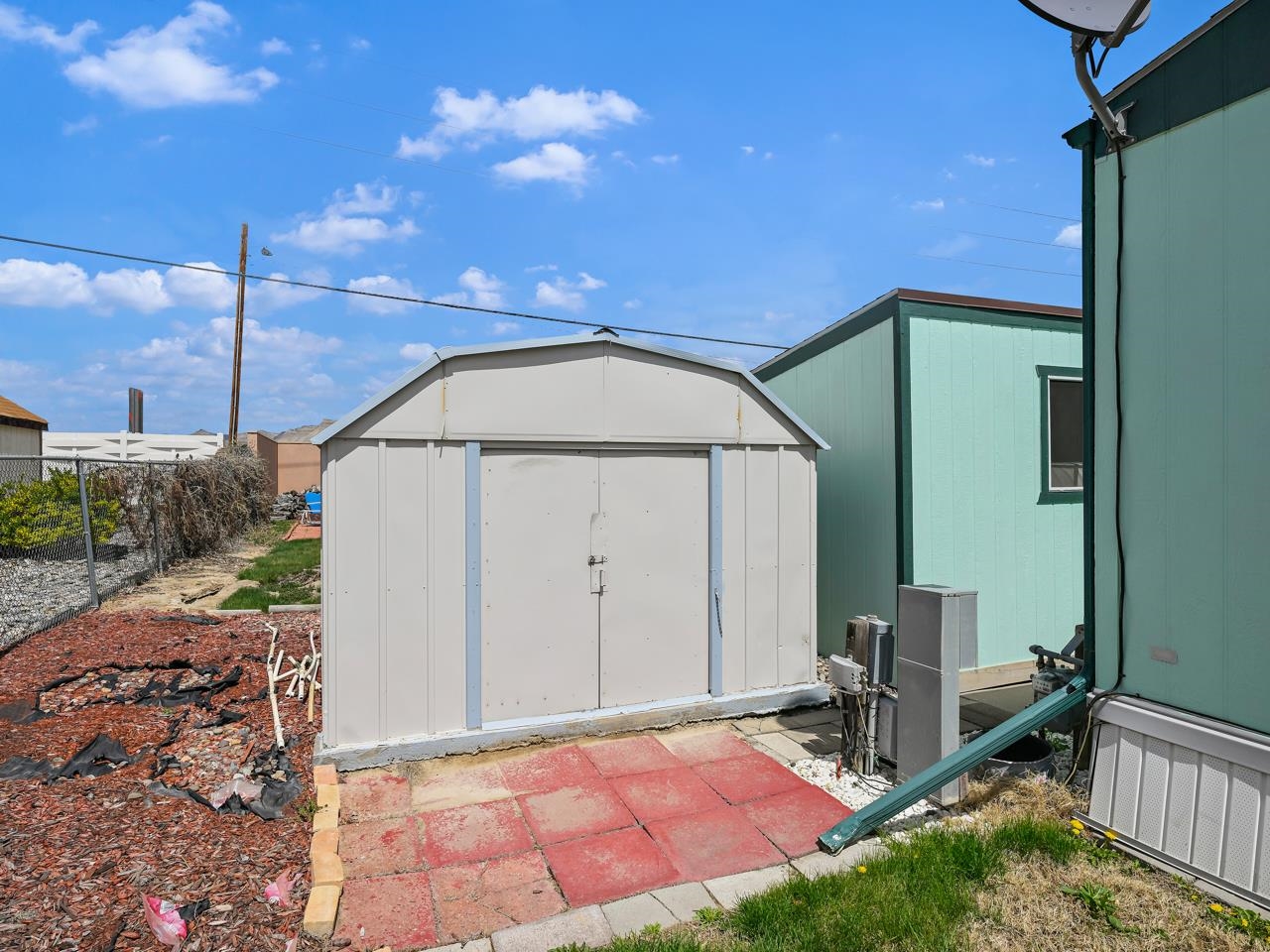 3195 F Road, Unit 22 Grand Junction, CO 81504 - Photo 24 of 24 a front view of a house with garden