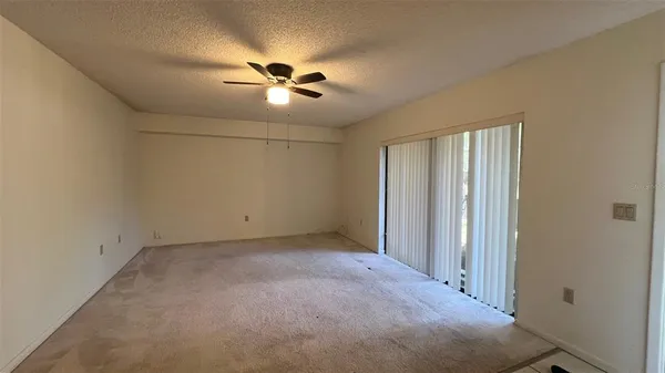 a view of a livingroom with a fan