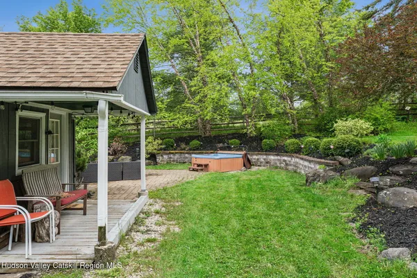 a backyard of a house with a garden view