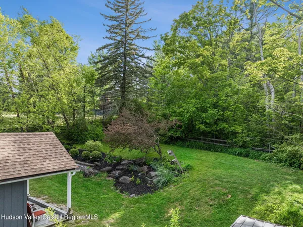 a view of a garden with houses